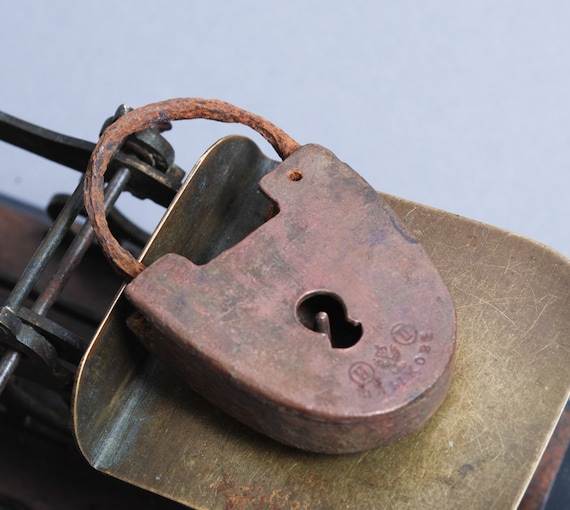 Antique miniature brass padlock original dark patina.