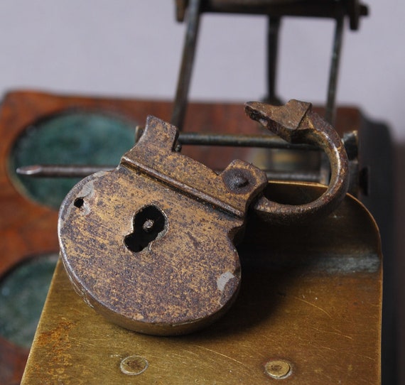 Antique miniature brass padlock original dark patina.