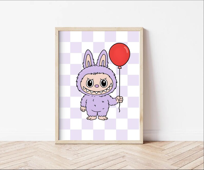 May include: A framed print featuring a cartoon monster in a purple bunny suit holding a red balloon. The monster has a wide grin and large eyes. The background is a checkered pattern of light purple and white.