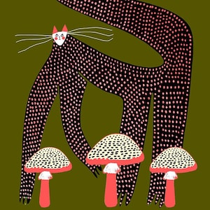 May include: A black cat with pink polka dots stands on its hind legs, with its front paws resting on three red and white mushrooms. The cat has a white face with pink cheeks and a small white nose.