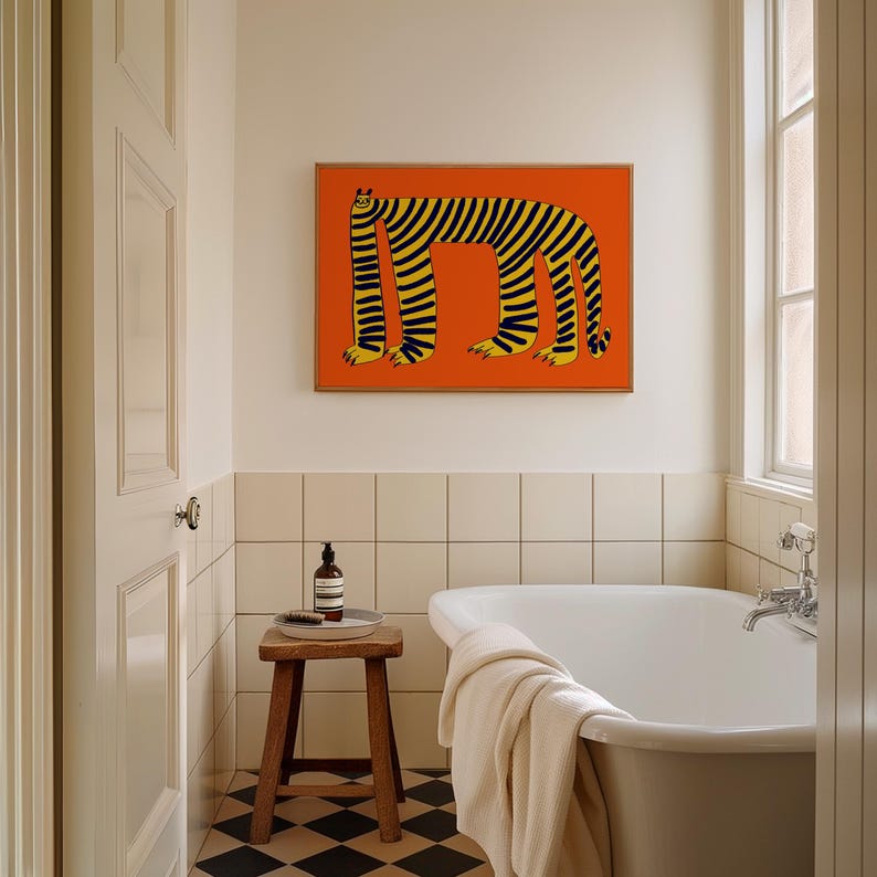 May include: A rectangular wall art print featuring a stylized illustration of a long-bodied tiger with black stripes on an orange background. The tiger has a small head, elongated torso, and four legs with visible claws, displayed in a simple wooden frame.