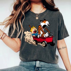 Unisex Calvin and Hobbes T-Shirt - Cozy Winter Apparel, Funny Comic Print Tee, Perfect Gift for Cartoon Lovers, Custom Designed