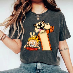 Unisex Calvin and Hobbes T-Shirt - Cozy Winter Apparel, Funny Comic Print Tee, Perfect Gift for Cartoon Lovers, Custom Designed