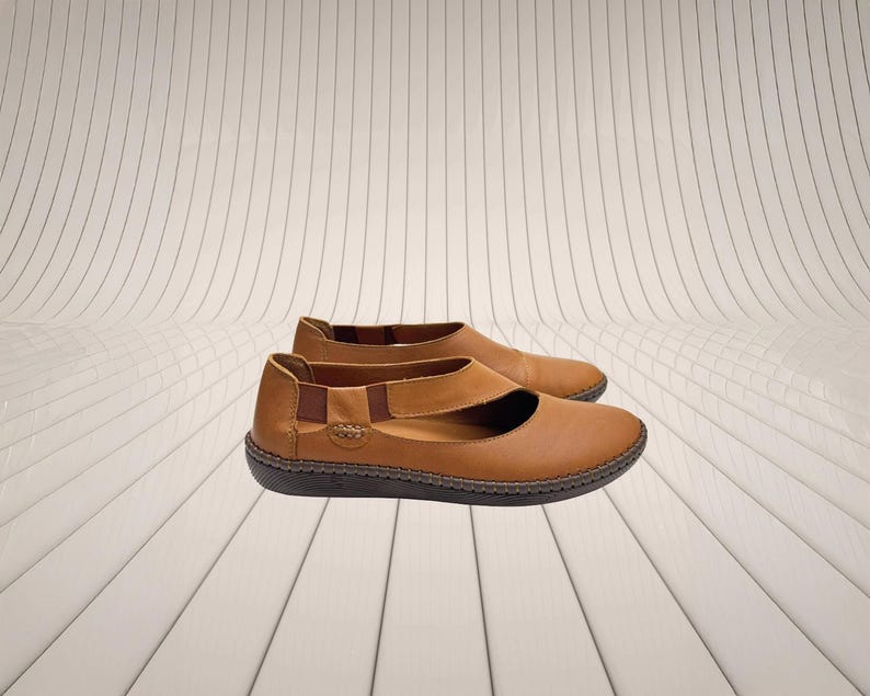 Handmade leather flats in caramel brown