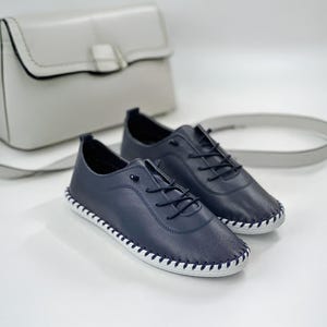 Elegant white handmade leather shoes with soft sole