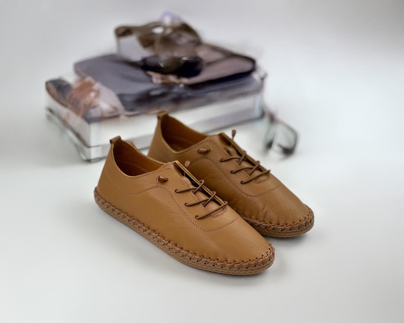 Handcrafted white leather shoes with minimalist style