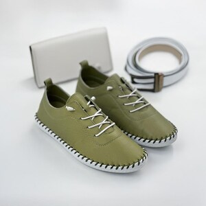 Comfortable white leather flats with soft lining