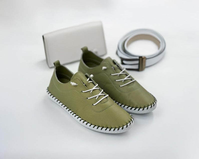 Comfortable white leather flats with soft lining