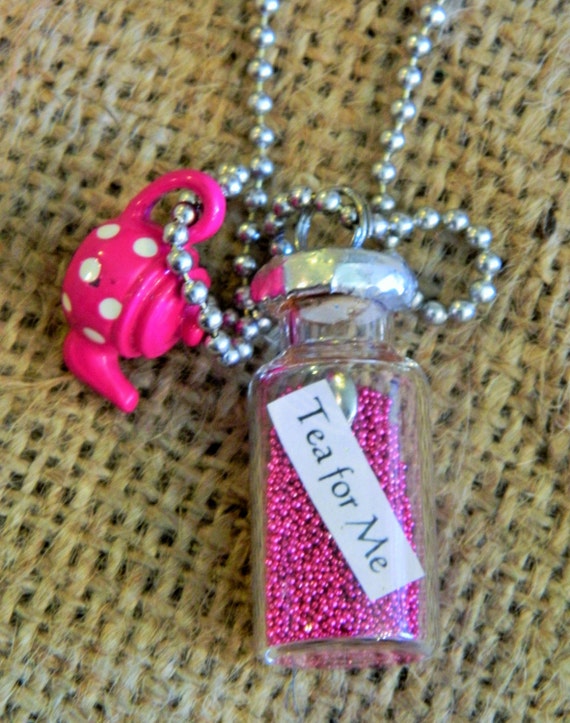 Items similar to Tiny Glass Bottle Necklace 30 inch Chain She Said on Etsy