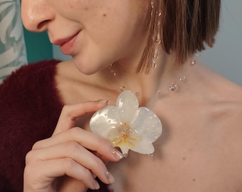 Echte witte orchidee ketting met glanzende afwerking - Hars en hypoallergeen roestvrij staal - Uniek handgemaakt botanisch sieraad