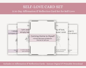 May include: A card set labelled "SELF-LOVE CARD SET" with the subtitle "A 30-Day Affirmation & Reflection Card Set for Self-Love." The cards are white with black text and floral line art. The set includes 30 affirmation and reflection cards.