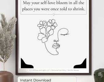 Könnte beinhalten: Schwarz gerahmter Kunstdruck mit cremefarbenem Hintergrund. Der Druck zeigt eine Strichzeichnung eines Gesichts mit Blumen und dem Text: "May your self-love bloom in all the places you were once told to shrink."