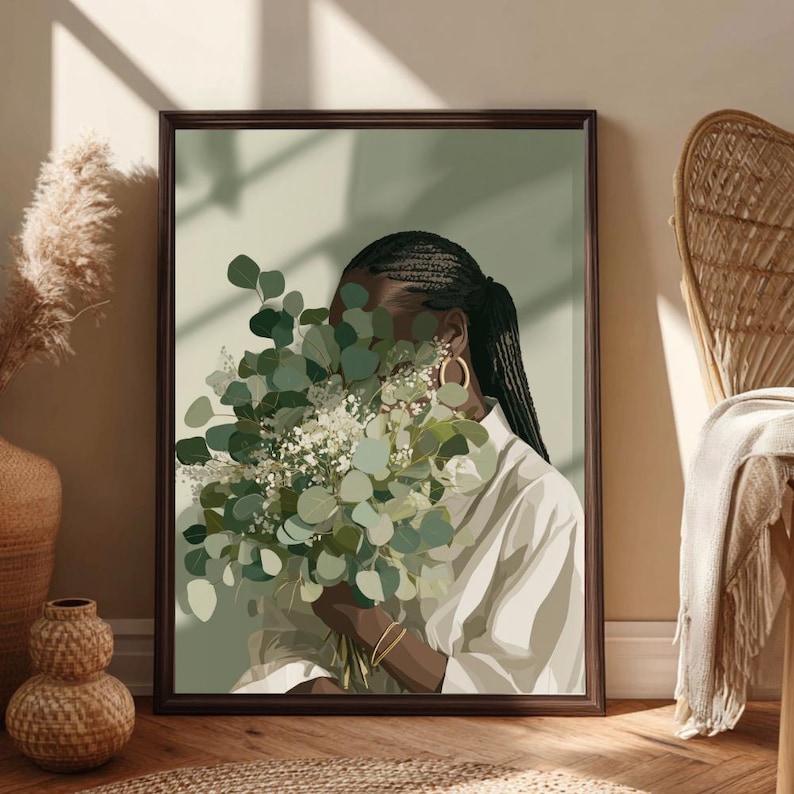 May include: A framed art print featuring a person holding a bouquet of green and white flowers. The person's face is partially obscured. The artwork has a neutral color palette with a dark brown frame and a light green background.
