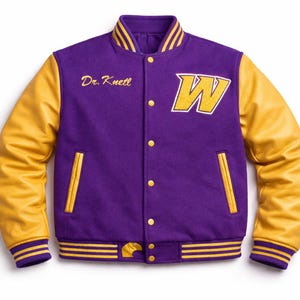May include: A purple and gold varsity jacket with a large yellow "W" patch and the name "Dr. Knell" embroidered on the chest. The jacket has gold leather sleeves, gold trim, and a button-up front.