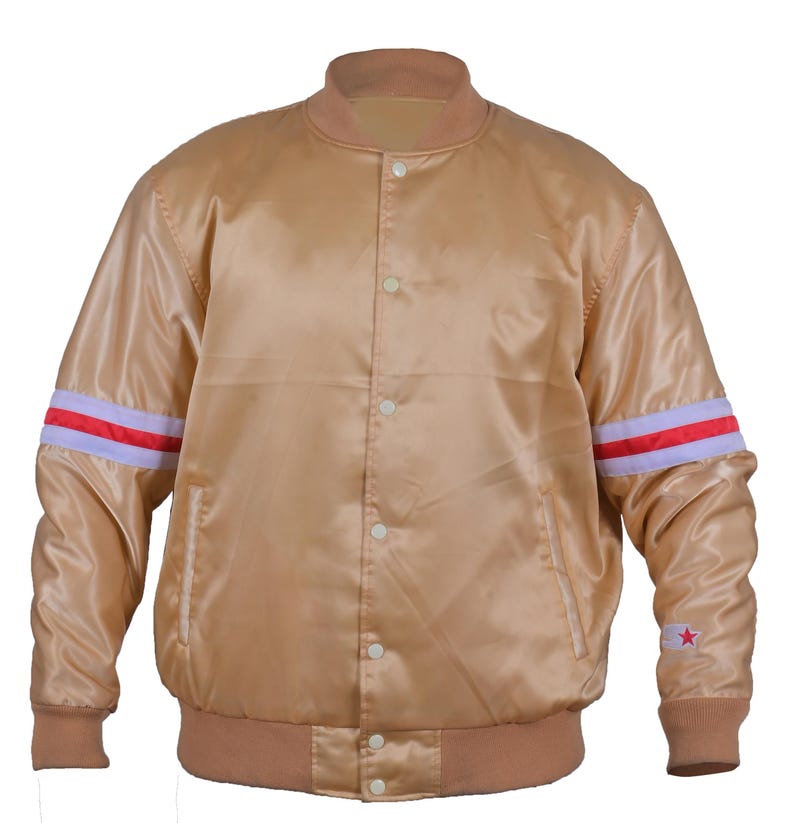 Golden satin varsity bomber jacket front view – unisex lightweight retro jacket with red and white arm stripes