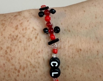 f1 car + driver initials/number bracelet