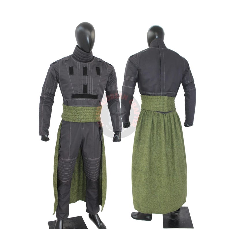 May include: A gray costume with a high collar, long sleeves, and a green sash. The costume has black accents and stitching details. The outfit is displayed on a mannequin, showcasing the front and back views of the garment.