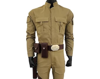 May include: A tan-colored jumpsuit costume with multiple pockets, a brown belt with a silver buckle, and a holster. The costume has long sleeves and is designed to resemble a military uniform or space-themed outfit. The mannequin is wearing black gloves.