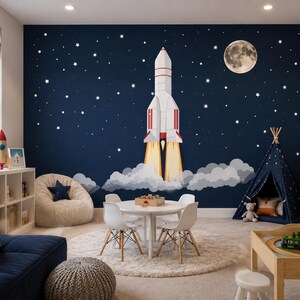 May include: A child's playroom with a navy blue wall mural featuring a rocket ship blasting off into space, a full moon, and stars. The room includes a white table and chairs, a beanbag chair, and a teepee.