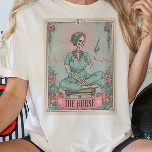 Nurse Graphic T-Shirt, Unique Unisex Tee, Medical Humor Shirt, Gift for Healthcare Workers, Halloween Inspired Apparel
