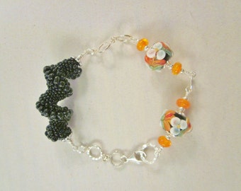 Floral "Orange and Black"  - Spiral Bracelet - Sterling silver - Artisan Crafted Lampwork Glass Beads, Unique, OOAK, SRAJD, Ready to Ship