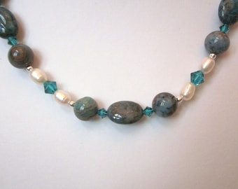 Necklace of  Blue (Dyed) Crazy Lace  Agate, White Freshwater Pearls, and Swarovski Crystal Accents