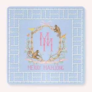 May include: Square, light blue decorative tray with a bamboo-style border. The center features a floral wreath with monkeys, birds, and the text "MERRY MAHJONG". Pink ribbon and the initials "MM" are also included.