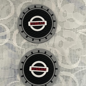 2pcs Nissan  Logo Auto Cup Coastera