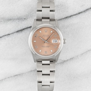 Rolex Oyster Perpetual Reference 15200 Salmon Arabic Dial 1990s 34mm Case