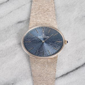 Vintage Jaeger LeCoultre Ellipse 18K White Gold 1970s Blue Floral Dial Manual Wind