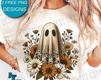 May include: Cream-colored t-shirt featuring a vintage-style ghost design surrounded by daisies and other flowers in shades of orange, brown, and white. The shirt has text that says "BONUS 2 FREE PNG DESIGNS" and "2 PNGS REGULAR & DISTRESSED".