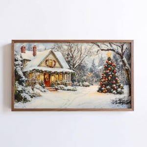 May include: A framed winter landscape painting depicts a snow-covered house with a red door and a decorated Christmas tree. The artwork features a cozy, festive scene with a warm, inviting glow from the house's windows and the tree's lights.