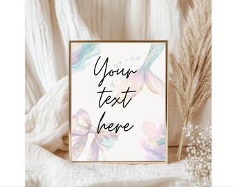 May include: Square framed print with a mermaid theme. The artwork features a mermaid tail, bow, and watercolor accents in pastel colors. The text "Your text here" is written in black script.