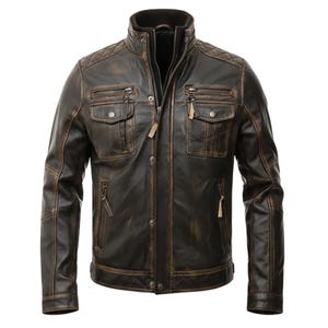 May include: A brown leather jacket with a stand-up collar and multiple pockets. The jacket has a zip-up front, button closures, and quilted shoulder detailing. The leather has a distressed, vintage appearance.