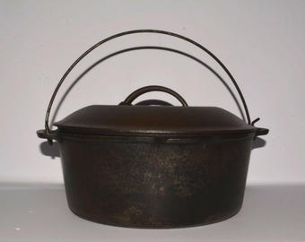 Olla de hierro fundido Wagner Ware Sidney O #8 vintage, modelo 1268 C, con tapa y asa.