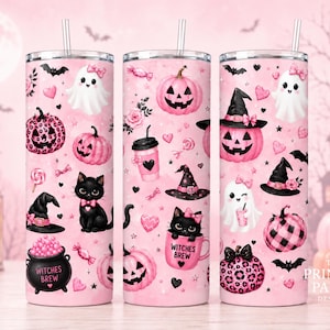 May include: Three cylindrical tumblers with lids and straws, featuring a pink background with a repeating pattern of black cats, pink pumpkins, ghosts with bows, witch hats, and black cauldrons labeled Witches Brew, along with hearts and bats.