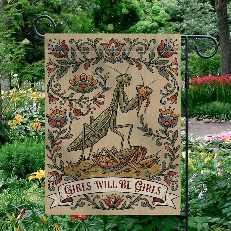 May include: A beige garden flag featuring a detailed illustration of a praying mantis holding a smaller insect. The design includes floral elements in red, blue, and orange, with the text "GIRLS WILL BE GIRLS" on a banner.
