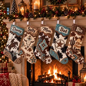 May include: Five personalized Christmas stockings hanging in a row. Each stocking features a unique western-inspired print with cowhide patterns, turquoise accents, and brown leather-look cuffs. The names Danny, Sully, Mom, Dad, and Bin are printed on the cuffs.