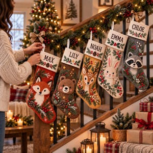 May include: Five felt Christmas stockings hanging on a wooden staircase railing. Each stocking features a unique embroidered animal: a fox, bear, deer, rabbit, and raccoon, with names Max, Lily, Noah, Emma, and Chloe stitched on the cuffs.