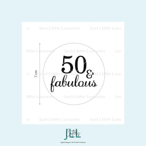May include: A white circle with the text "50 & fabulous" in black script. The circle is 7 cm in diameter. The image also includes the text "Just Little Luxuries" and the logo of "JHL Clutters".