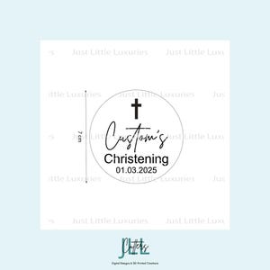 May include: A white circular design with the text "Custom's Christening 01.03.2025" and a cross symbol. The design is 7 cm in diameter. The background is light blue.