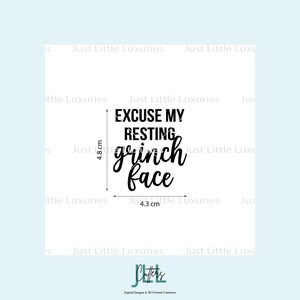 May include: A black cookie cutter design featuring the text "EXCUSE MY RESTING grinch face" in a mix of block and script fonts. The design includes dimension lines indicating a height of 4.8 cm and a width of 4.3 cm for the cutter shape.