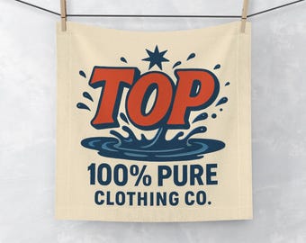 May include: A beige cloth towel with the word "TOP" in red and blue lettering, with a star and water splash design. Below the word "TOP" is the text "100% PURE CLOTHING CO."