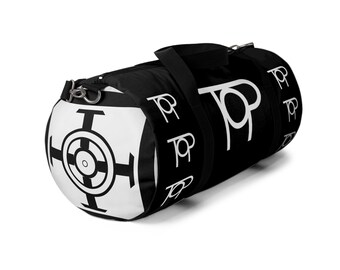 May include: Black and white duffel bag with a circular design on one end and the letters "PP" repeated on the side. The bag has a shoulder strap and metal hardware.