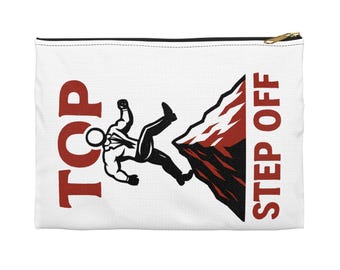 May include: White zippered pouch with a graphic of a person falling off a cliff. The words "TOP" and "STEP OFF" are printed in red. The zipper is gold.