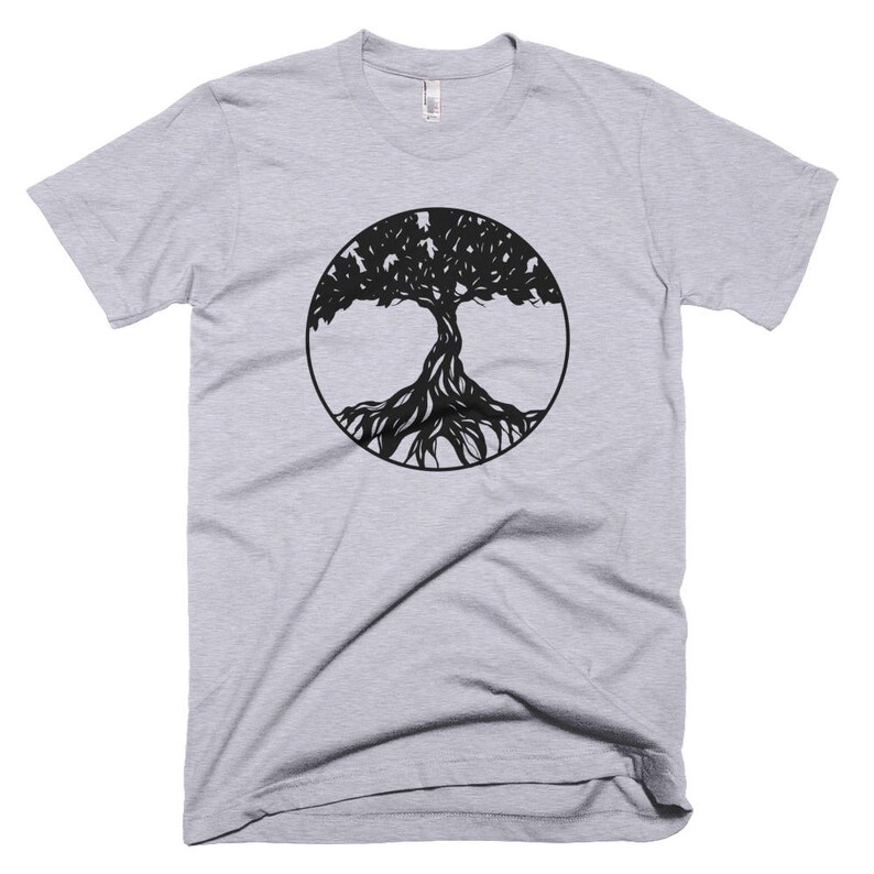 May include: A heather grey t-shirt with a black tree of life design in a circle.