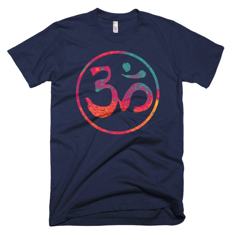 May include: A navy blue t-shirt with a colorful Om symbol in a circle. The symbol is a popular spiritual symbol in Hinduism and Buddhism.