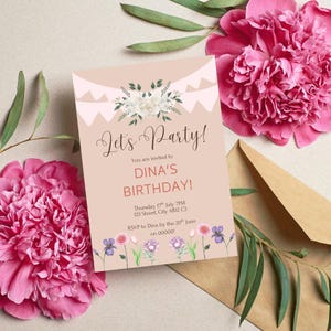 May include: A birthday party invitation with the text "Let's Party!" and "DINA'S BIRTHDAY!" in elegant script. The invitation is decorated with floral elements and a banner design, with pink flowers in the background.