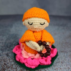 Handmade Crochet Monk on Lotus | Amigurumi Monk Doll in Orange Robe | Wool Meditation Figurine | Spiritual Home Decor Gift