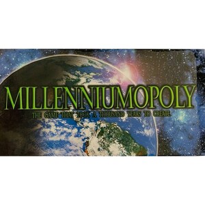 May include: A board game box with the title "Millenniumopoly" in green letters over an image of Earth. The tagline reads "The Game That Took A Thousand Years To Create." The background features a galaxy and a colorful aurora.